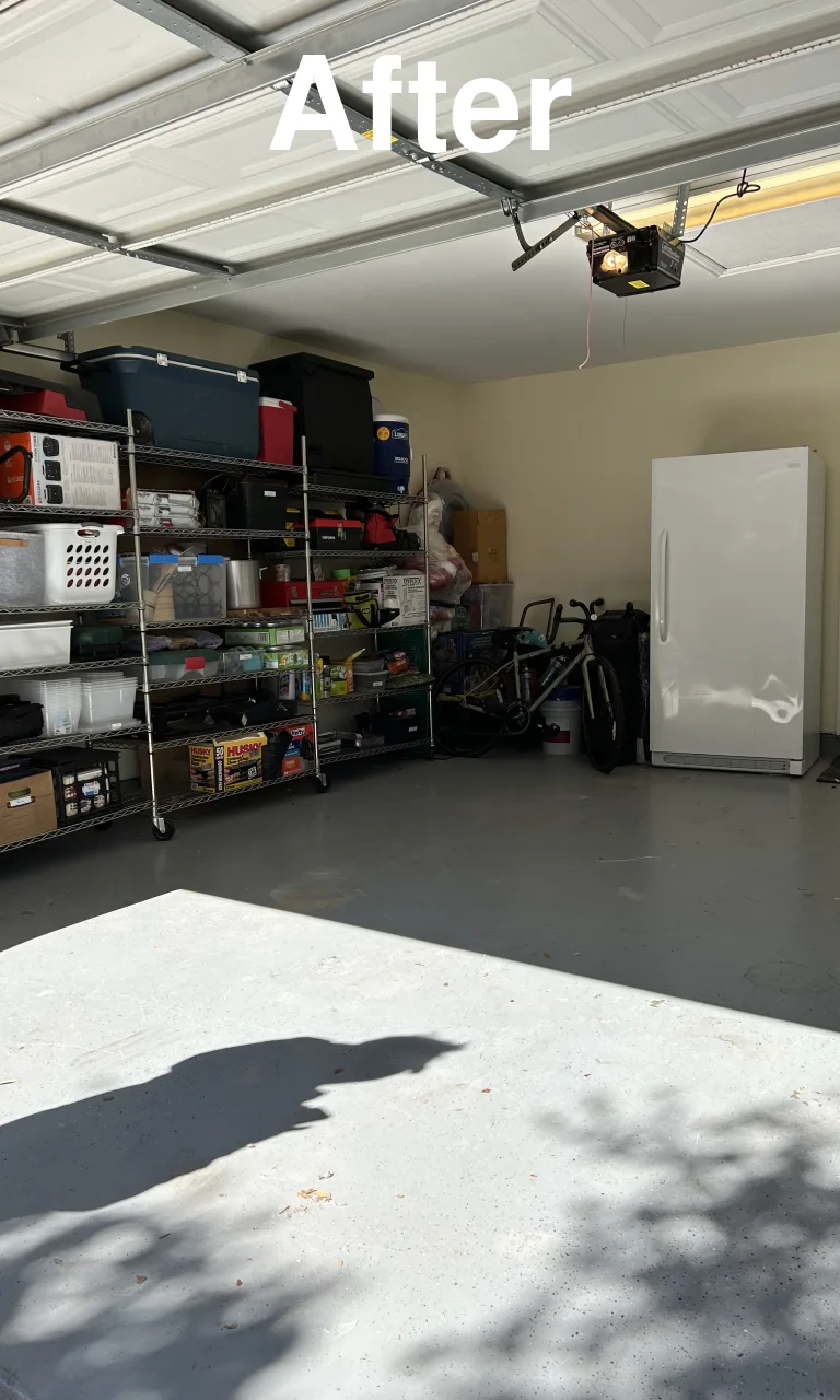 Garage with wire shelving and storage bins before and after - After
